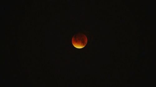 Low angle view of moon in sky