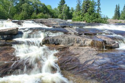Stream flowing through rocks
