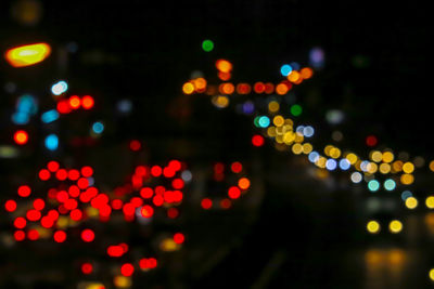 Defocused image of illuminated lights at night