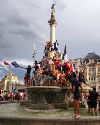 Group of people in front of building