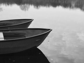 Boats in calm lake