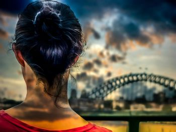 Close-up of woman against clear sky