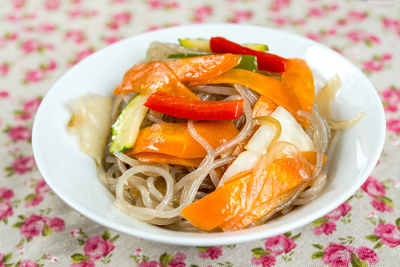 High angle close-up of noodles served in bowl on table