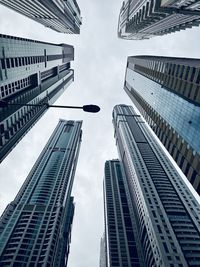 Low angle view of modern buildings in city