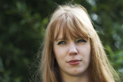 Close-up of young woman looking away