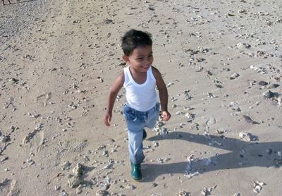 High angle view of boy on beach