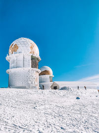 Built structure against clear blue sky