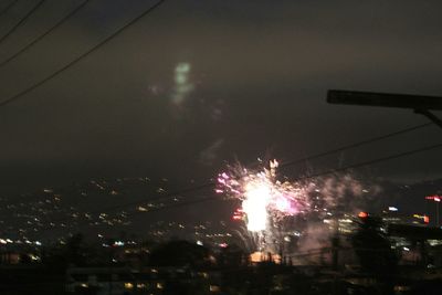 View of illuminated city at night