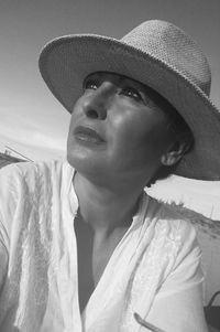 Close up of young woman wearing hat