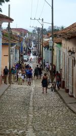 People walking on street in city