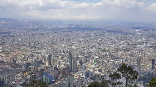 High angle view of modern buildings against sky