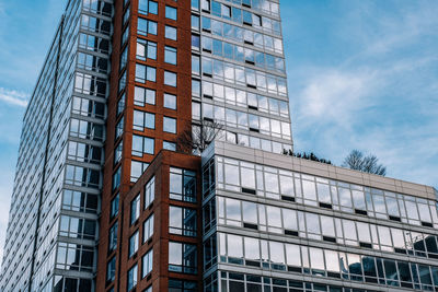 Low angle view of modern building against sky