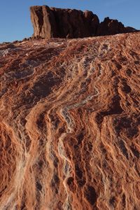 Rock formation in desert against sky