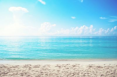 Scenic view of sea against blue sky