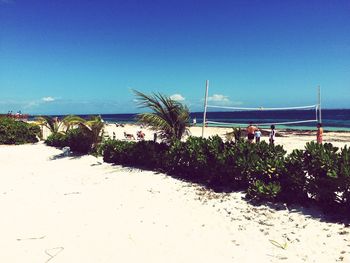 Scenic view of sea against blue sky