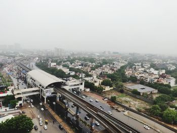 High angle view of street amidst buildings in city