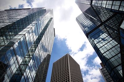 Low angle view of modern buildings against sky