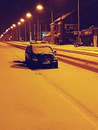Car on street at night