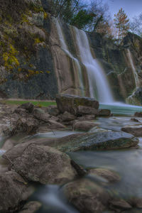 Close-up of waterfall against trees