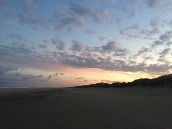 Scenic view of dramatic sky during sunset