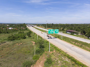 View of road passing through field