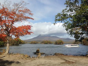 Scenic view of lake against sky during autumn