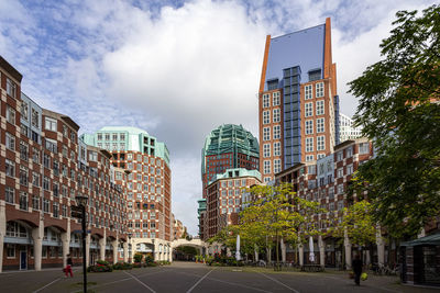 Buildings in city against sky