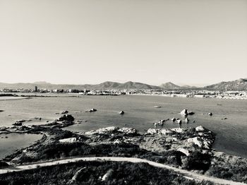 Scenic view of beach against clear sky