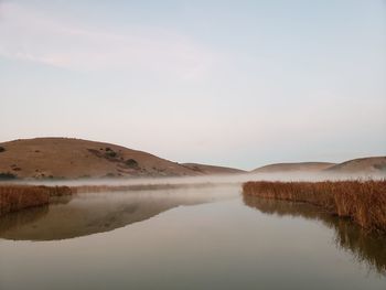 Scenic view of lake against sky