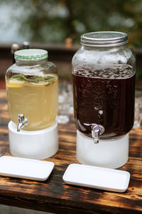 Close-up of glass jars on table