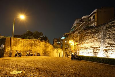 Illuminated street lights at night