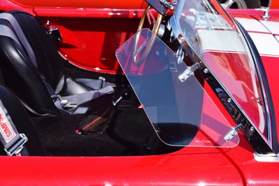 Close-up of red vintage car