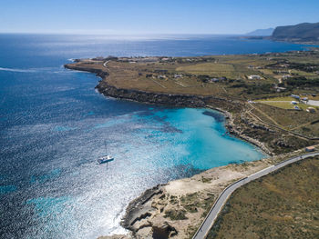 High angle view of sea shore against sky