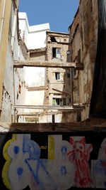 Low angle view of old building against sky