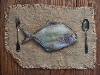 High angle view of fish on table