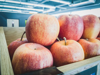 Close-up of apples in crate