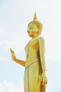 Low angle view of statue against sky