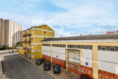 Cars on road against sky