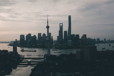 Modern buildings in city against sky