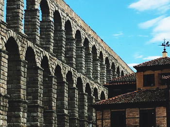 Low angle view of old building against sky