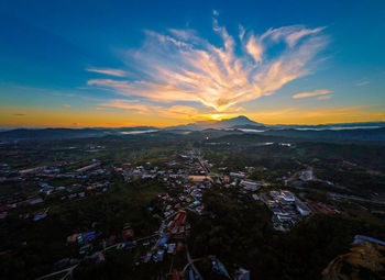 High angle view of townscape against sky during sunset