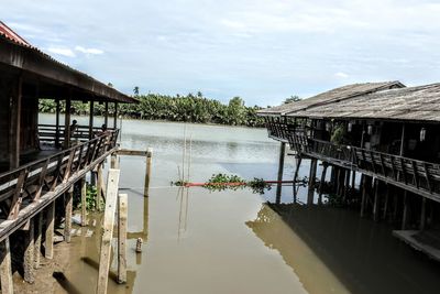 Panoramic view of pier and buildings against sky