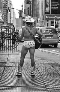 Woman walking on city street