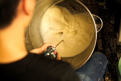 Close-up of person preparing food