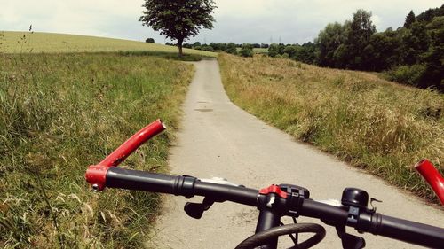 Road passing through field