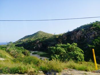 Scenic view of mountains against clear sky