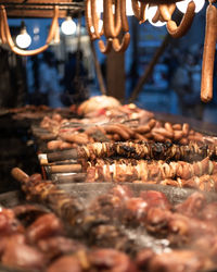 High angle view of meat on barbecue grill at market