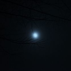 Low angle view of moon in sky