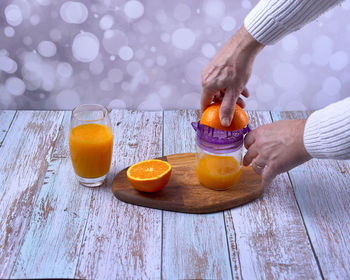 Midsection of man preparing food on table