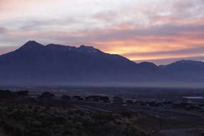 Scenic view of mountains against sky during sunset